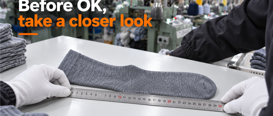 Quality inspector measuring a grey sock sample at a Canfly Knitting QC workbench